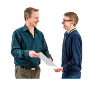 Two people facing each other, person on left hand side has a piece of paper in his hand and is showing this to the other person