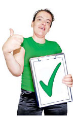 Woman holding a clipboard with a green tick on it