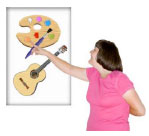Woman pointing to a poster with a paint pallet and a guitar on it