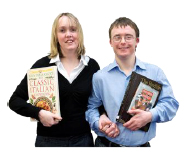 Two people holding books