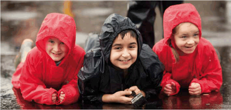children in raincoats