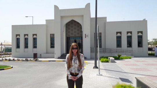 Jenny Steele, SWI consultant outside the newly constructed Ashgal customer service building in Doha, Qatar where she has developed new customer processes and systems with client.