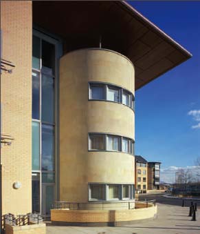 A landmark building turns the corner at the edge of Gorbals Park