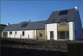 New and old buildings in the Gigha landscape