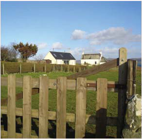 A single house fitting in next to an older house