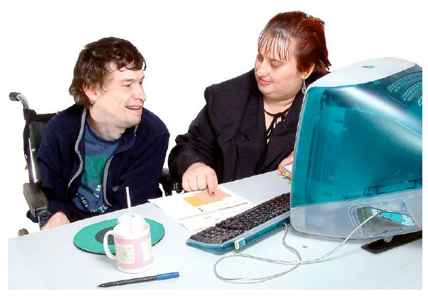 Man and a women sitting at a desk