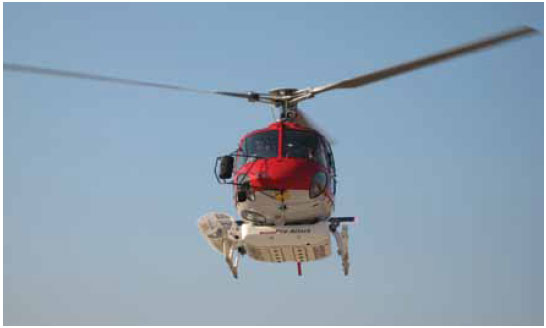 Photo B9.6 A helicopter fitted with water helitanks