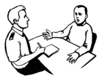 A man and a Police officer sitting at a table. The man is talking and the Police officer is listening and taking notes