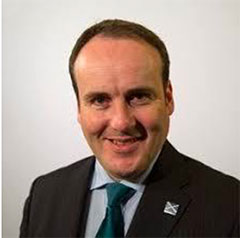 a photograph of Paul Wheelhouse MSP – Minister for Energy, Connectivity and the Islands. 