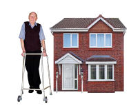 Person standing with a zimmer frame, with a house beside him