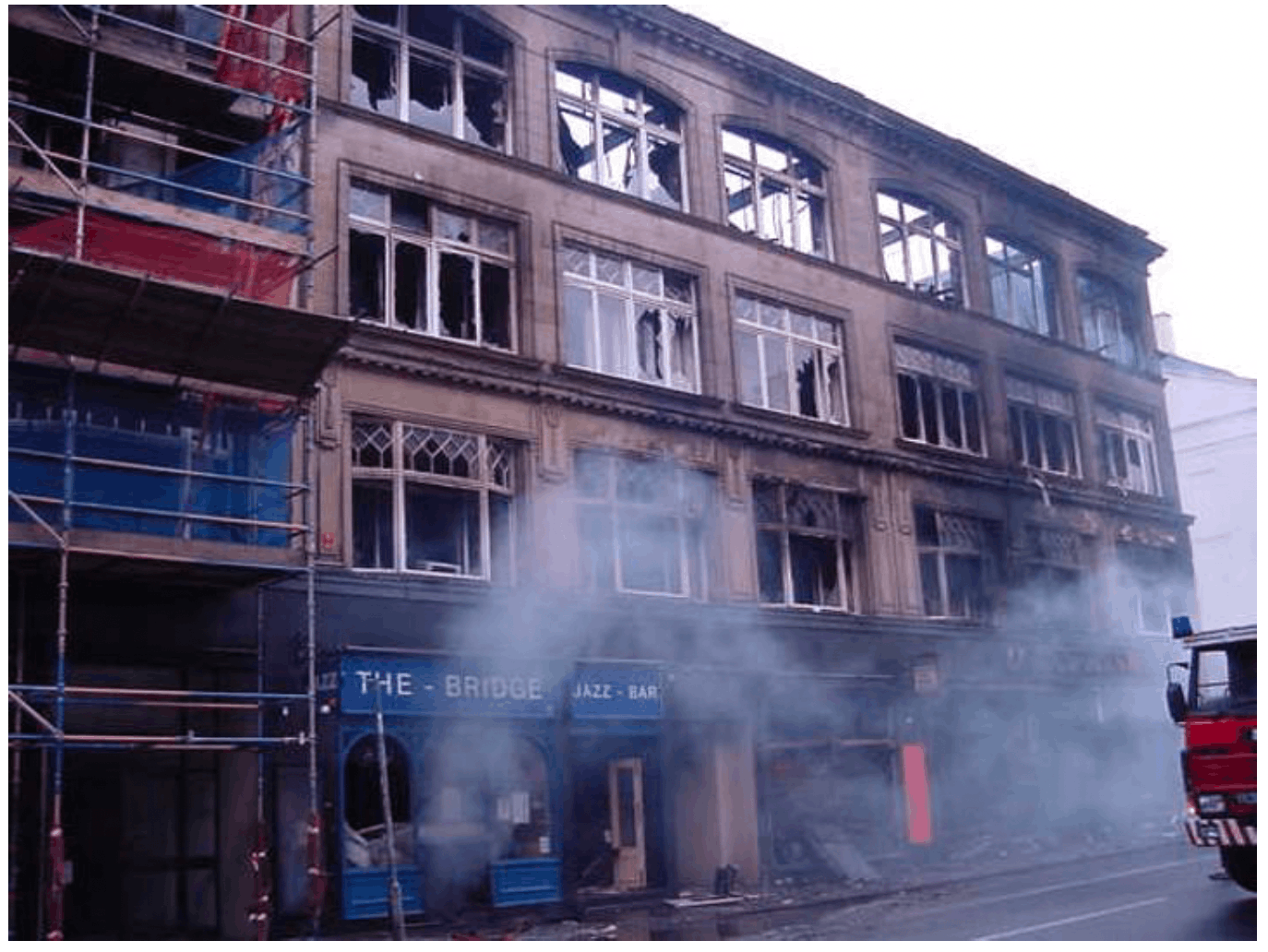 Image of the fire damage to the facade of a building