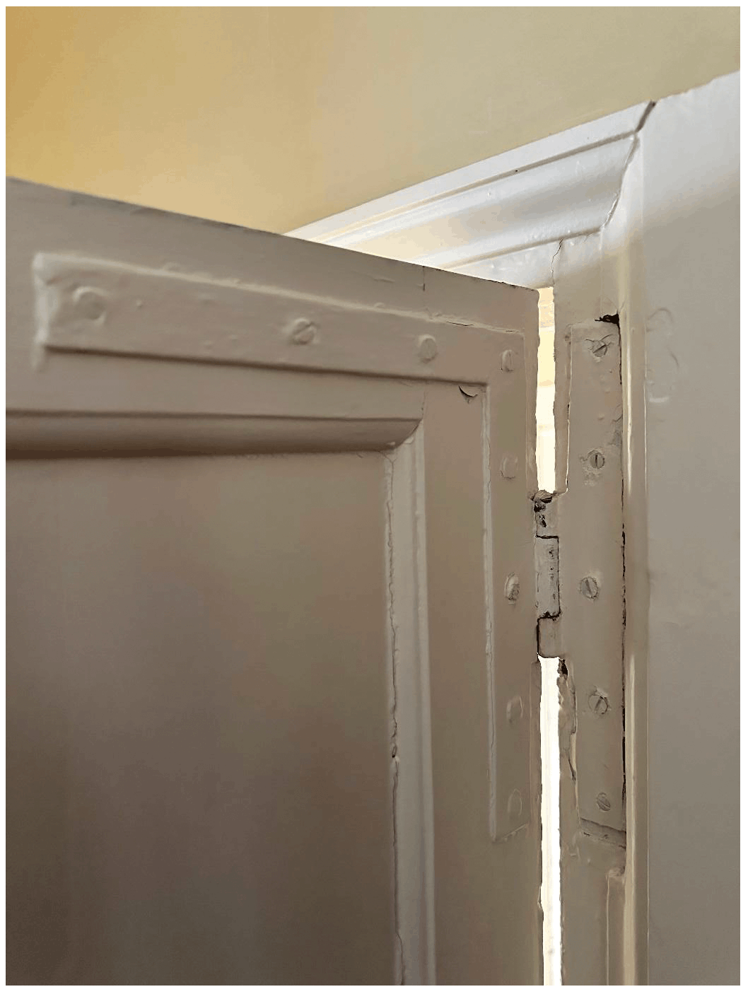 Historic door with a cast iron hinge