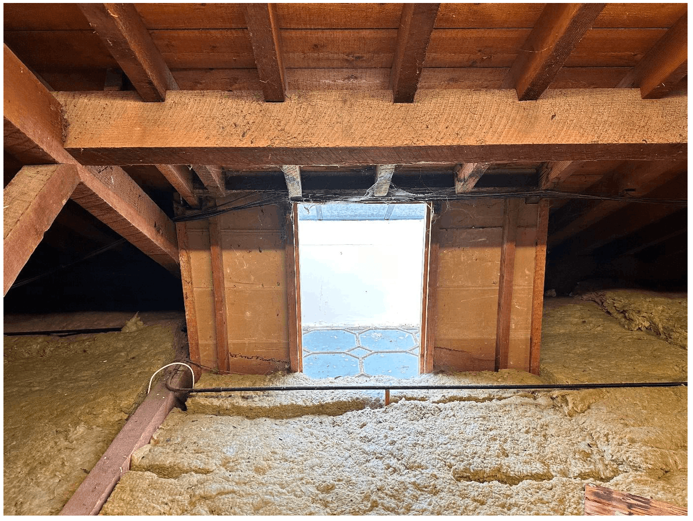 Lightwell penetrating roof void