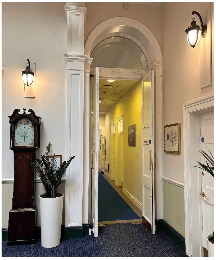 Fire door with a magnetic hold open device