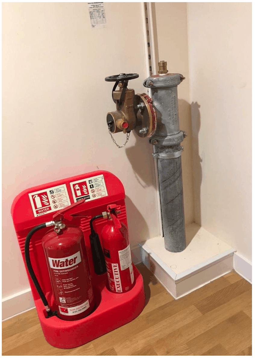 Fire extinguishers and a fire hose outlet
