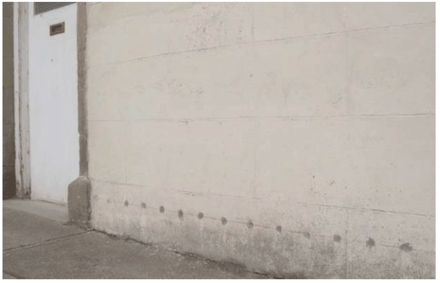 Chemical damp-proofing inserted into a historic wall