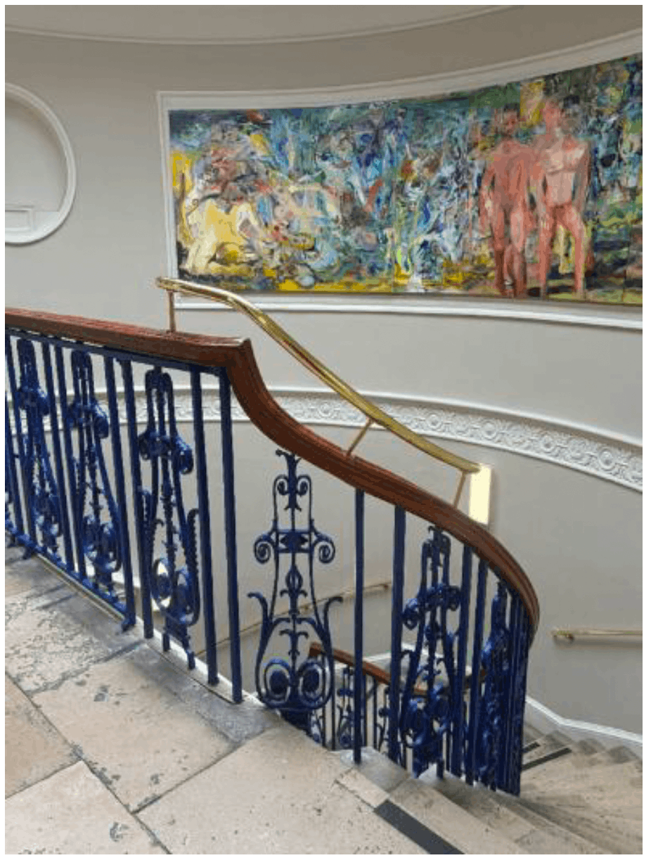 Addition of localised rail and wall mounted handrails to improve safety on main stair