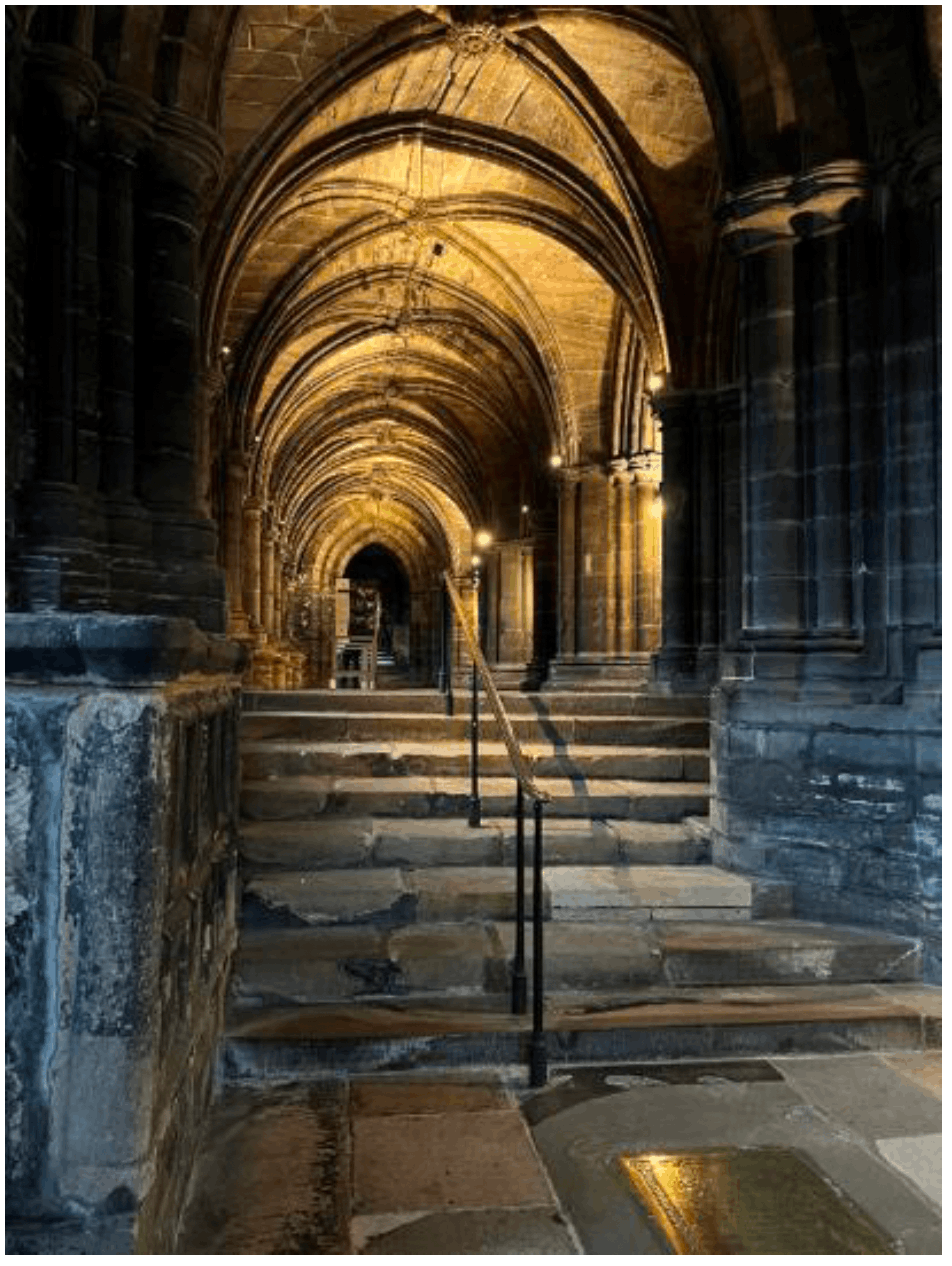 A simple elegant central handrail divides wide steps and provides support with minimal physical and visual impact