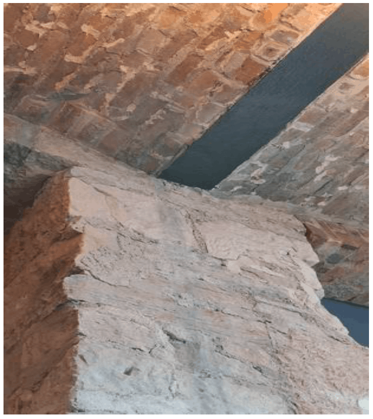 Example of a steel beam with a vaulted ceiling, which can be a point of leakage where the structures join