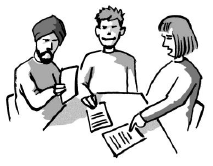 three people having a meeting round a table, looking at documents and talking about them