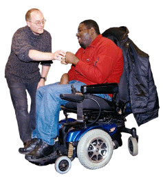 Helping a person in a wheel chair