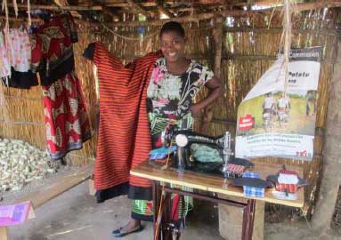 Patuma - one of the women involved in manufacturing reusable sanitary towels at the Fistula Care Centre at Bwaila Hospital in Lilongwe - showcases a dress she has made. Patuma - one of the women involved in manufacturing reusable sanitary towels at the Fistula Care Centre at Bwaila Hospital in Lilongwe - showcases a dress she has made.