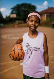 Participant in the Shooting Touch initiative in Rwanda, using basketball to engage women and girls in rural Rwanda as part of the Scottish Government/ Comic Relief Levelling the Field Programme. Participant in the Shooting Touch initiative in Rwanda, using basketball to engage women and girls in rural Rwanda as part of the Scottish Government/ Comic Relief Levelling the Field Programme.