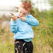 boy playing with a stick