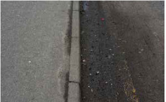 Detritus Grade D: Road surfaces are obscured or at high risk of hazard caused by detritus