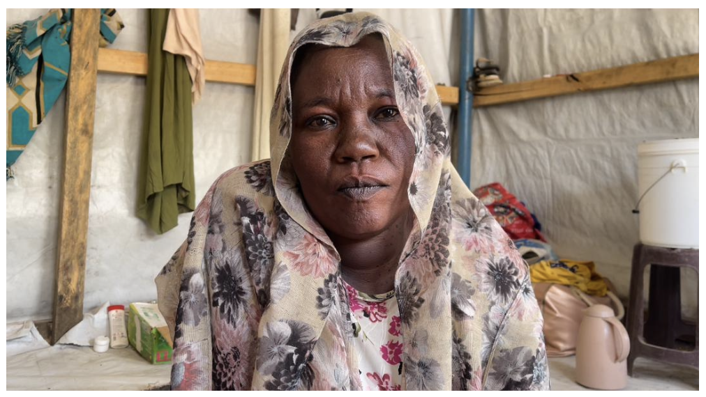 Manal looking at the camera.