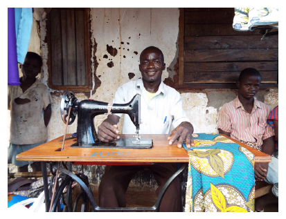 Alex with sewing machine