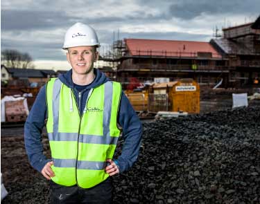 Photo of Dominic Lunny at a building site