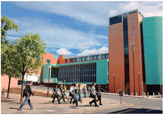 Image of Abertay University campus with students.