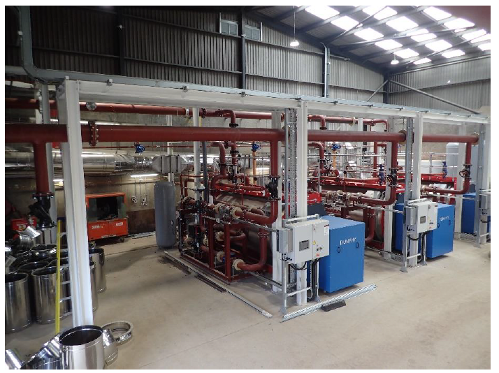 Torry heat network energy centre showing heat pumps and associated pipework.