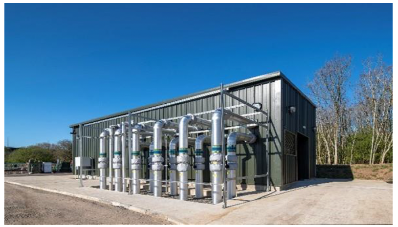 Energy Centre at AMIDS heat network showing external pipework. 