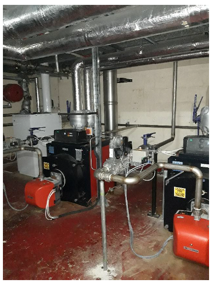 Room with biogas boilers and pipework