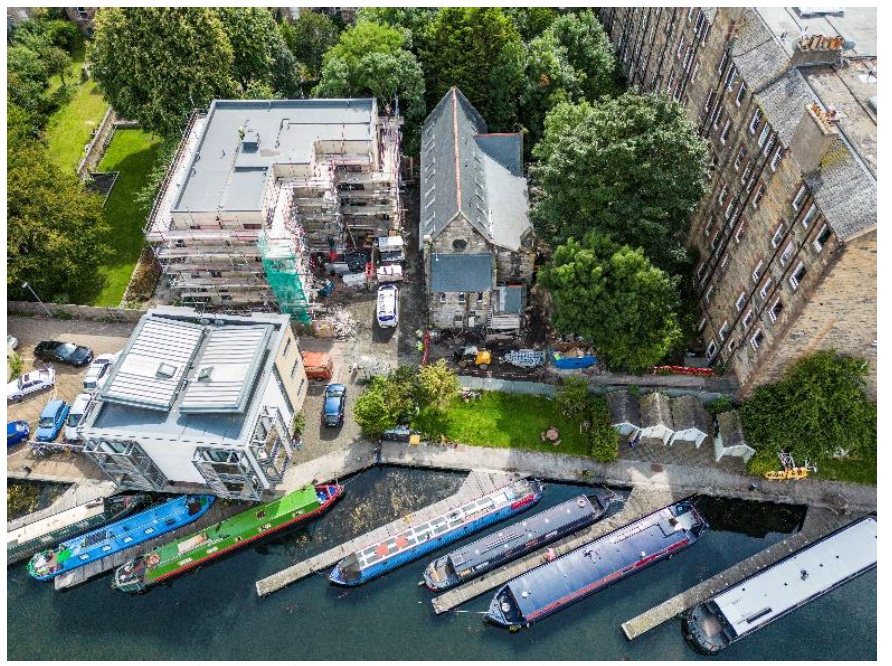 Aerial view of the LAR Housing Trust development in Fountainbridge including new build flats and church conversion. 