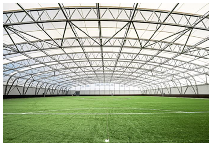 A large indoor football field
