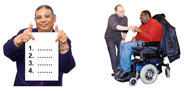 Women holding a sign and a man in a wheelchair