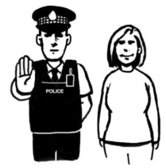 A woman standing next to a Police officer who is protecting her