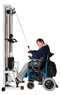 A man in a wheelchair using a weights machine in a gymnasium