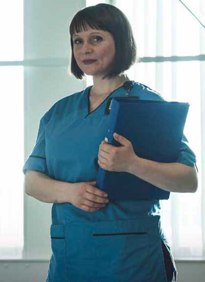 Photo of Alina, Senior staff nurse, NHS Grampian, Pictured in Aberdeen Royal Infirmary Neurology Department, Born in Romania