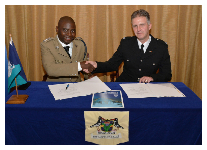 Figure 1.1. Assistant Superintendent Alexander Ngwala and Superintendent Shaun McKillop at Scottish Police College signing joint memorandum of understanding (MoU).