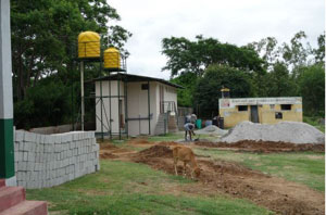 Image: New toilet block (left) and the old toilet block to the right