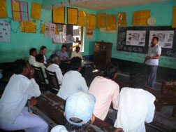 Image: Community engagement: Discussing the final co-created design plan with the school and local community