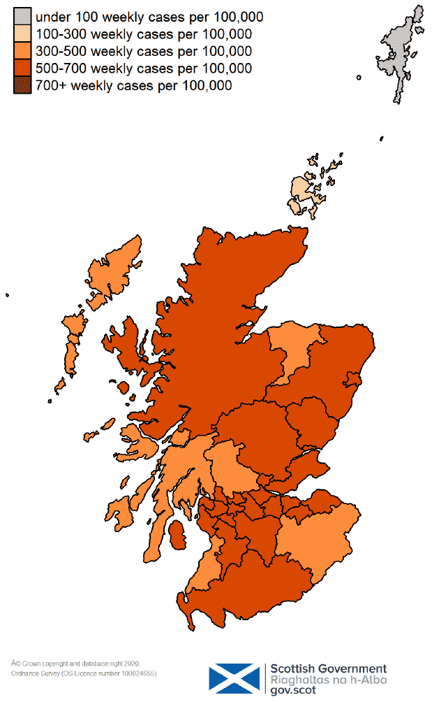 a colour coded map of weekly new positive cases per 100,000 people in each local authority in Scotland, in the week leading up to 16 January 2022, ranging from grey for under 100 weekly cases per 100,000, through very light orange for 100 to 300, orange for 300-500, darker orange for 500-700, and very dark orange for over 700 weekly cases per 100,000 people.