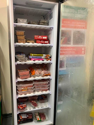 A photo of surplus food stored in a freezer.  