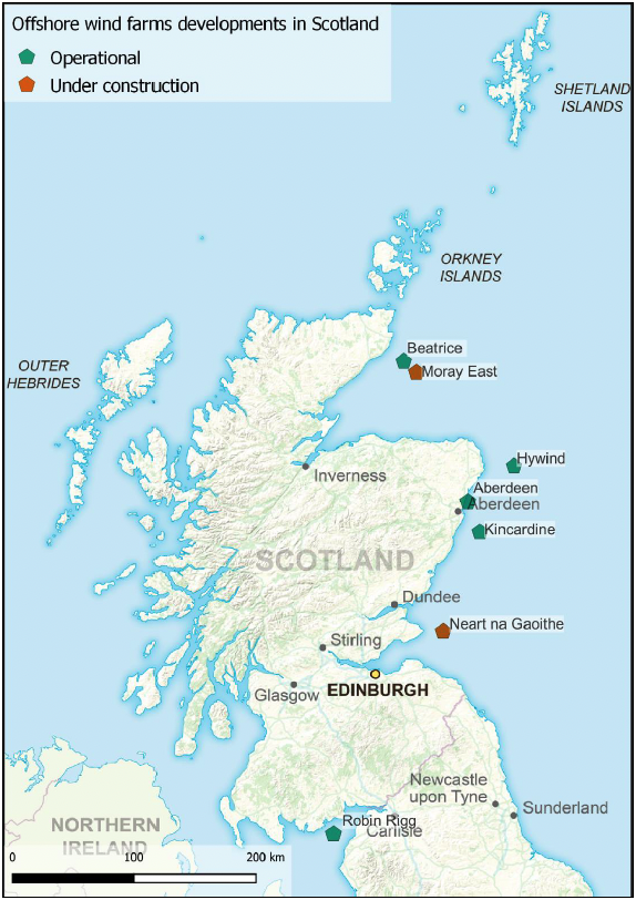 shows the location of wind farm developments in Scotland. It consists a of a map of Scotland with symbols in red showing the offshore wind developments that are under construction, an symbols in green showing those that are operational.
