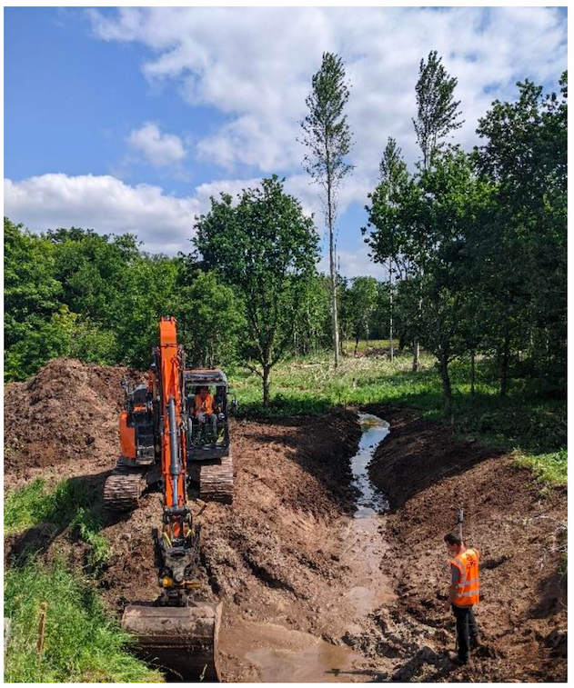 Photo of the Peffery Wet Woodland project, showing a new channel being constructed