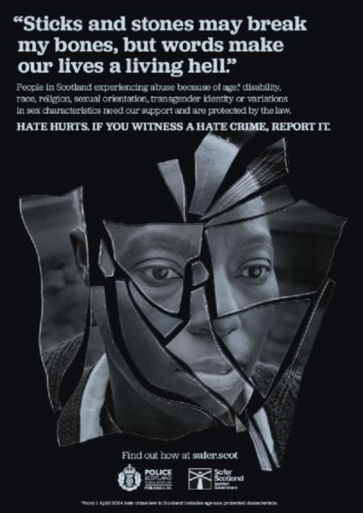 A poster with a person looking through shattered glass for the Hate Hurts campaign. 